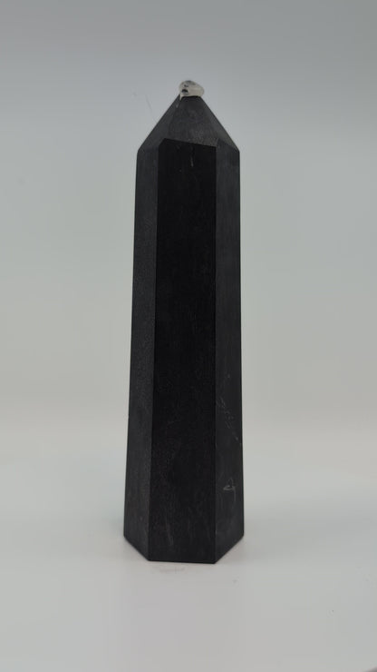 Showcase video of heavy 535g deep-black Shungite tower displaying uniform surface and energy presence.