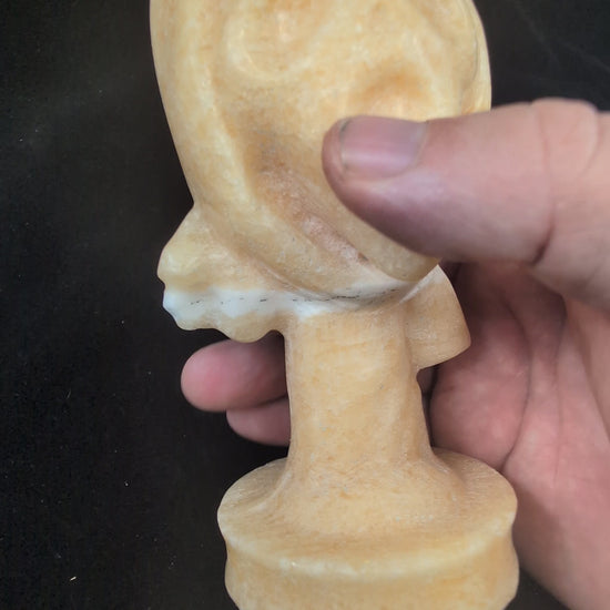 360 video of Yellow Calcite “The Scream” crystal carving, 750g