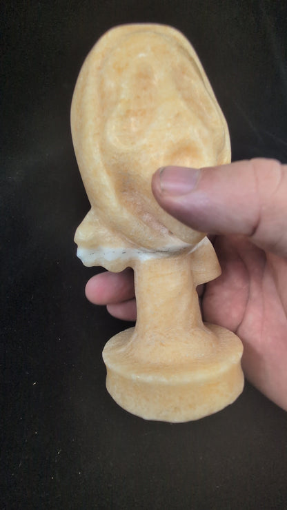 360 video of Yellow Calcite “The Scream” crystal carving, 750g