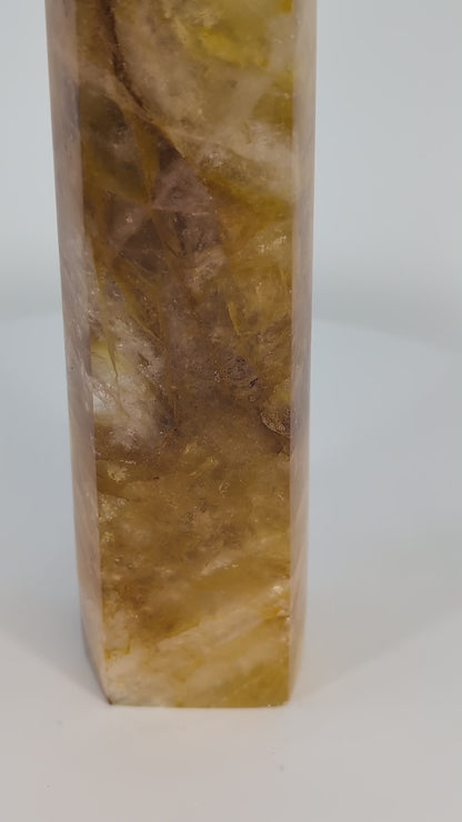 Golden Healer Quartz Tower 835g from Brazil shown in natural light — full 360° rotation highlighting golden zoning, high clarity, and polished termination