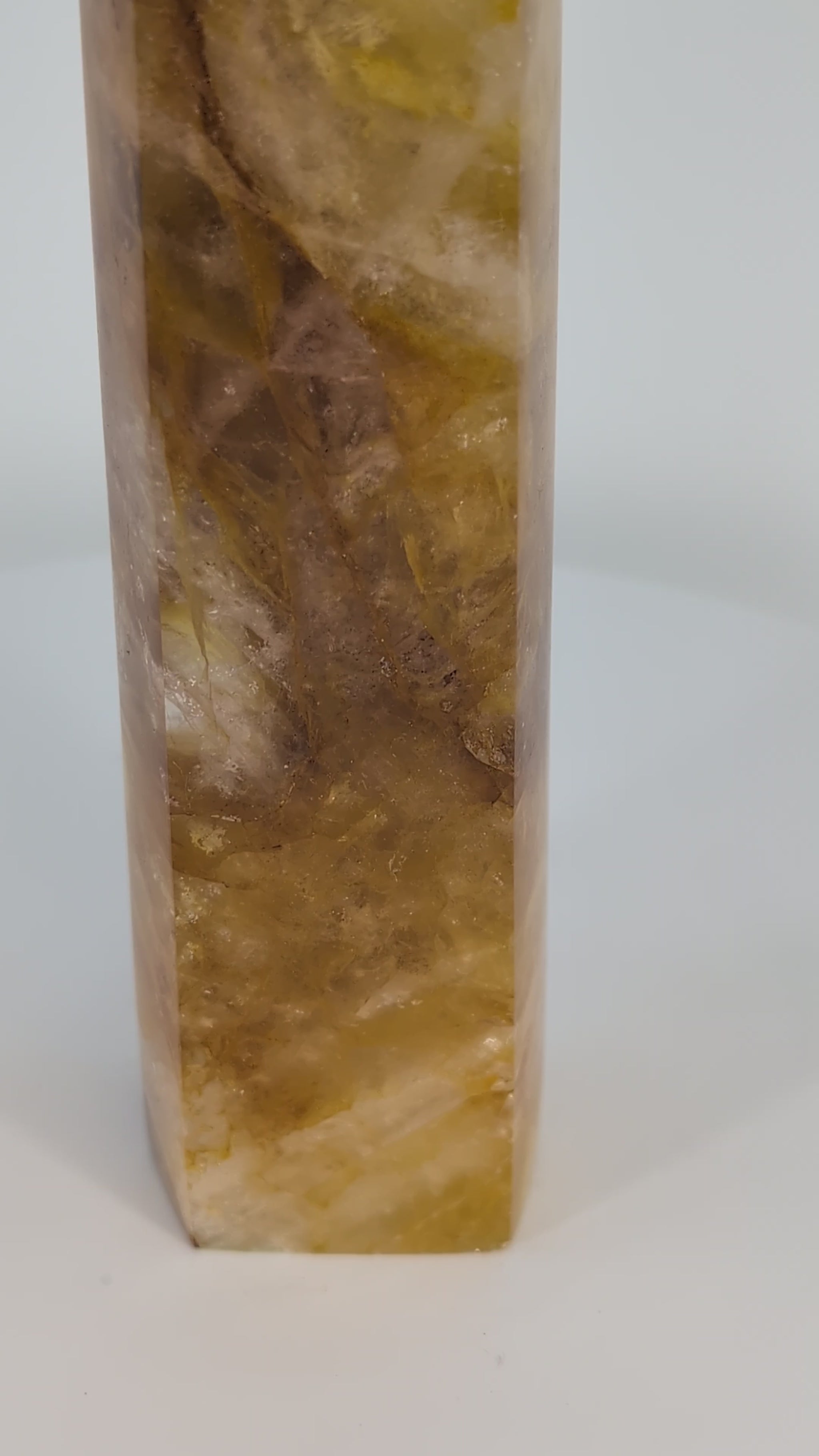 Golden Healer Quartz Tower 835g from Brazil shown in natural light — full 360° rotation highlighting golden zoning, high clarity, and polished termination