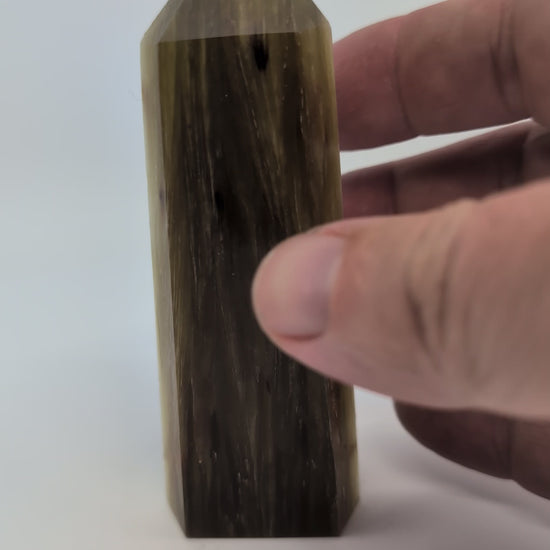 360° rotation video showing Golden Mica tower with bronze sheen and fibrous structure