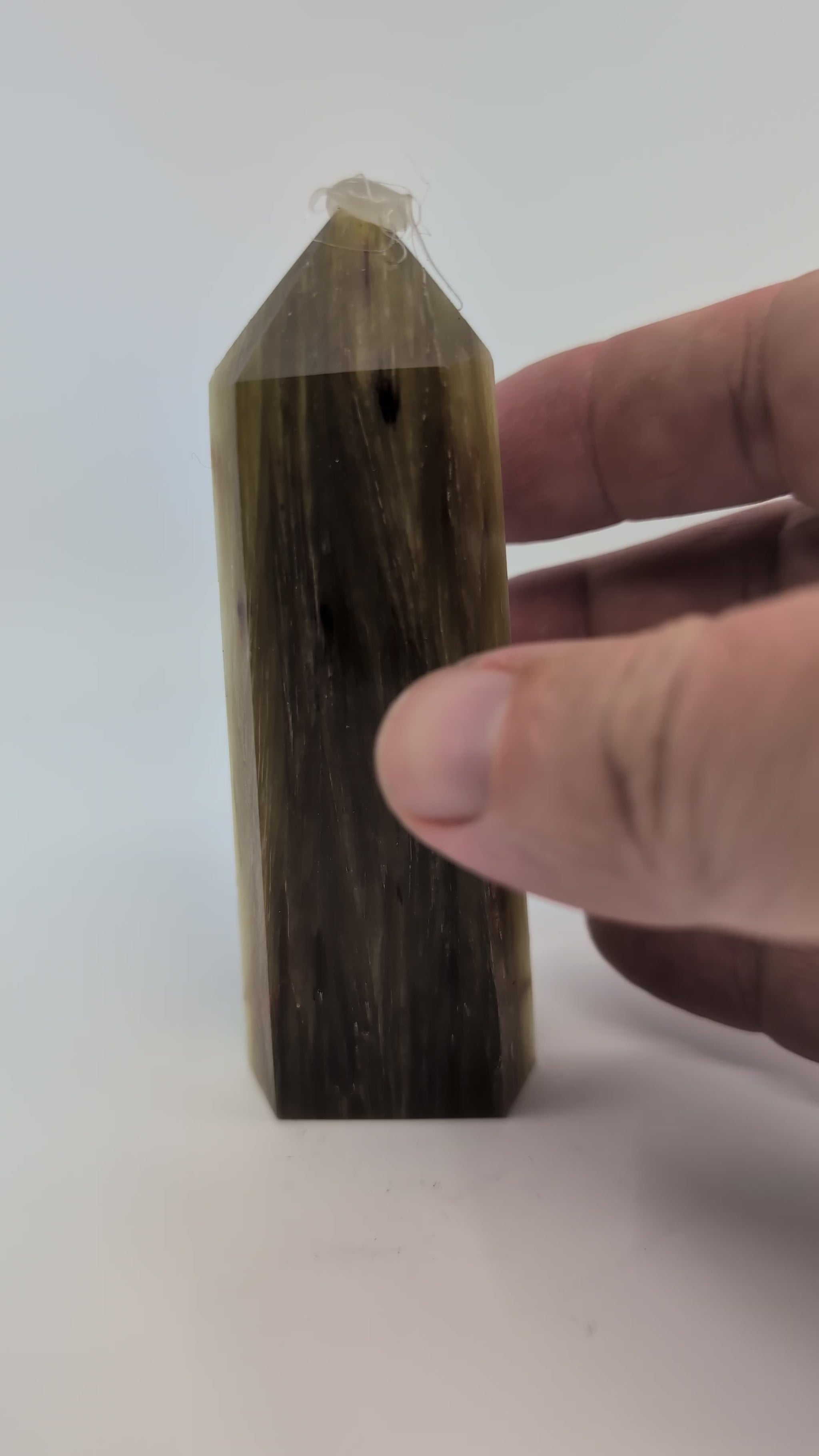 360° rotation video showing Golden Mica tower with bronze sheen and fibrous structure