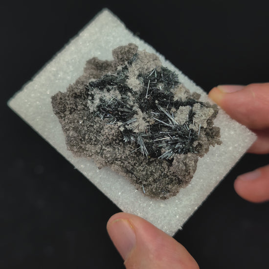 360-degree video of stibnite with calcite from Baia Sprie, Romania