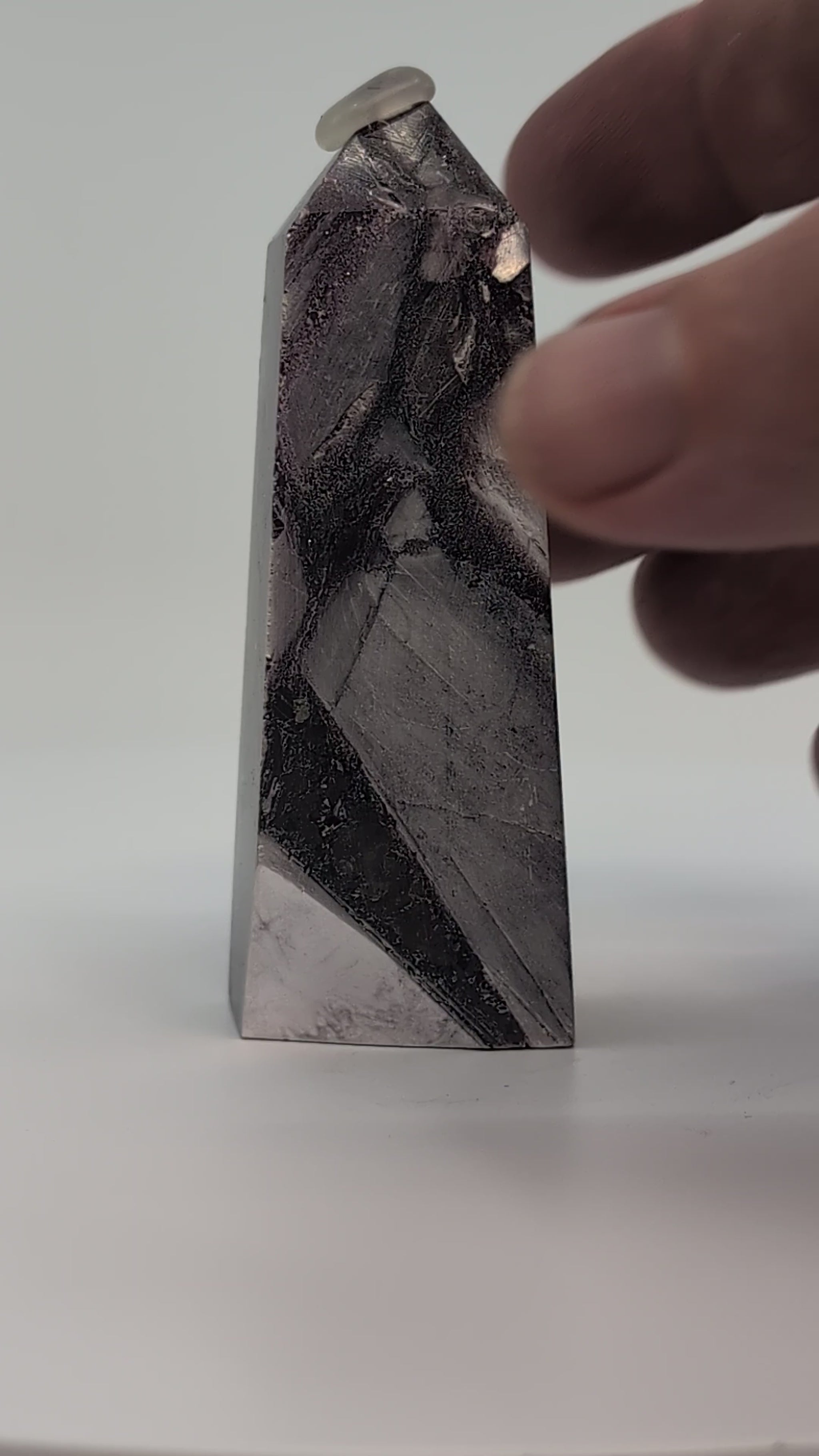 360° rotation video of polished Lepidolite tower from Minas Gerais showing lilac-grey mica zoning and sheen
