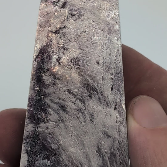 360-degree rotation video of polished Lepidolite tower from Minas Gerais Brazil highlighting mica sheen and layered veining