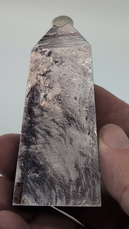 360-degree rotation video of polished Lepidolite tower from Minas Gerais Brazil highlighting mica sheen and layered veining