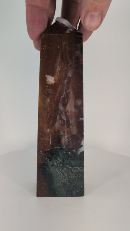 Ocean Jasper Tower OJ-04 video – 16.5 cm, 445 g, multicolor greens and yellows with orbicular pattern. Premium Madagascar jasper tower in full-light rotation.