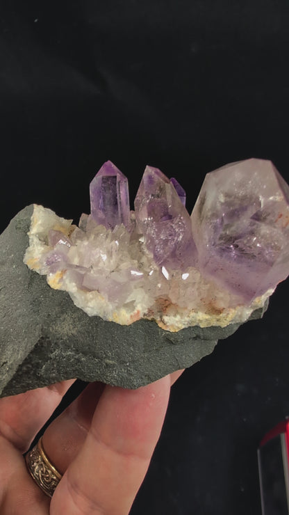 360 video of Brandberg amethyst cluster with large main crystal and enhydro inclusion