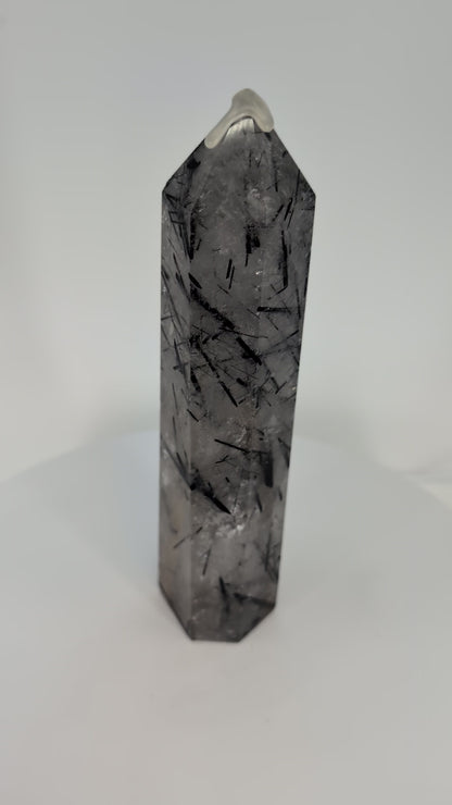360° view of polished Black Tourmaline in Quartz tower from Brazil showing clarity and detailed inclusions.360° view of polished Black Tourmaline in Quartz tower from Brazil showing clarity and detailed inclusions.