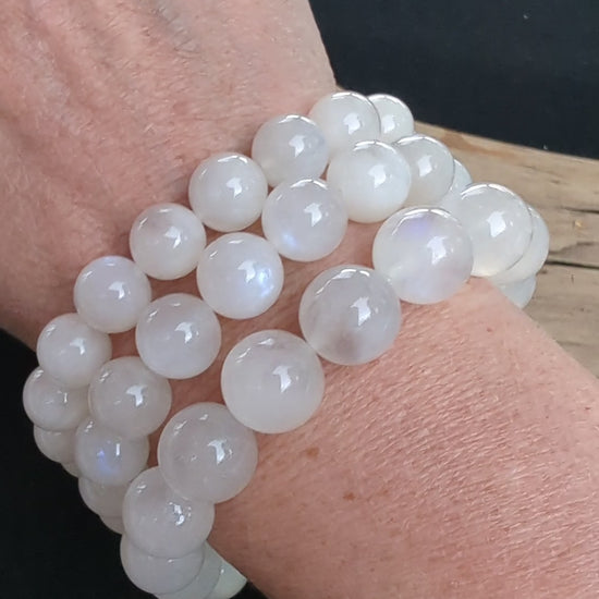 A video stacked presentation of three Sri Lankan Moonstone bracelets in 10mm, 11mm, and 12mm sizes worn on a wrist.