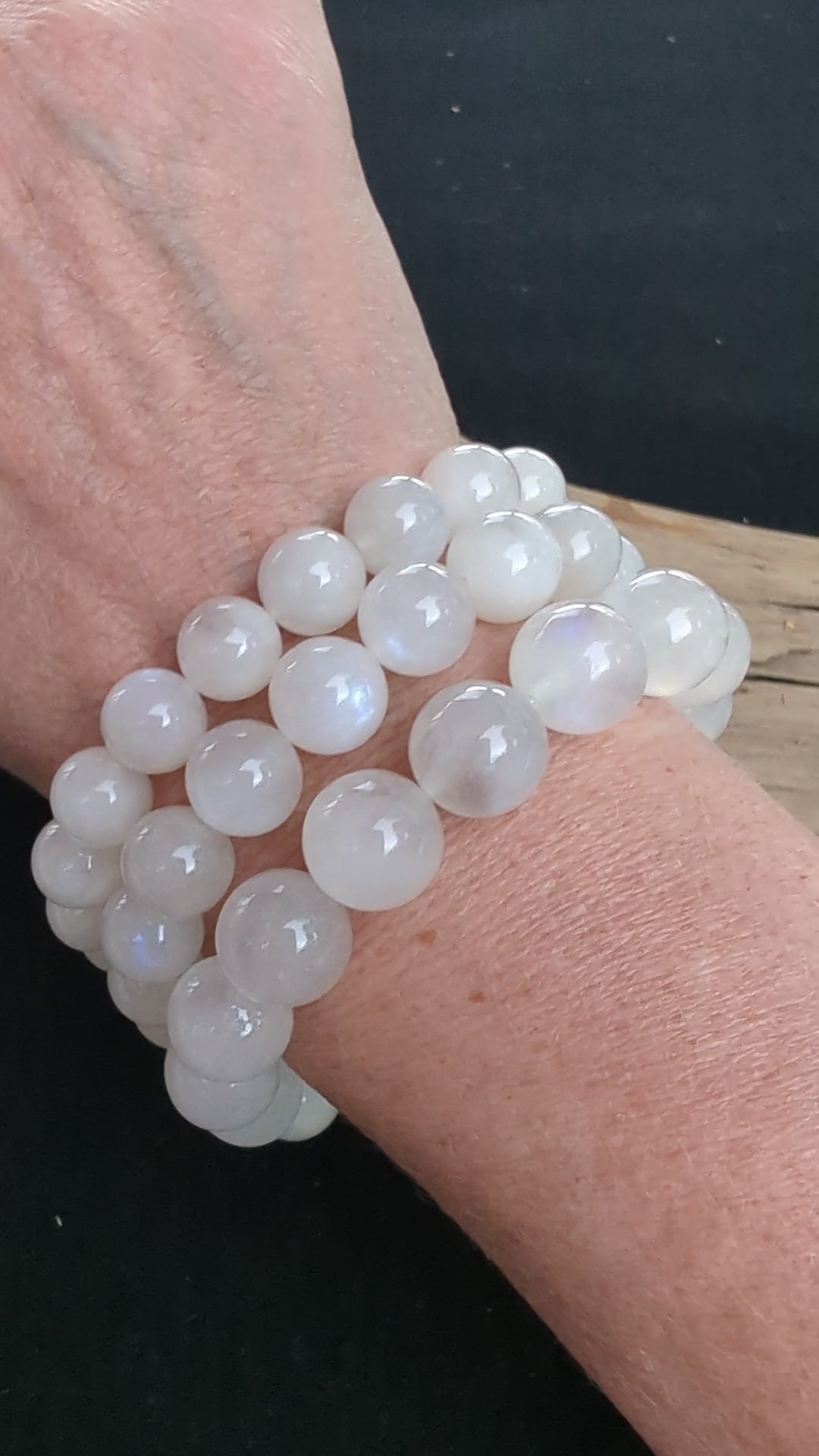 A video stacked presentation of three Sri Lankan Moonstone bracelets in 10mm, 11mm, and 12mm sizes worn on a wrist.