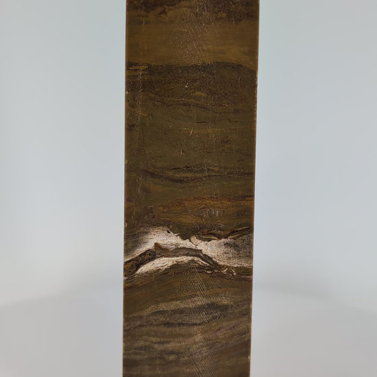 Ocean Jasper Tower OJ-03 video – 16 cm, 425 g, deep red-brown banded jasper. Vertical rotation highlighting concentric banding and high-gloss polish.