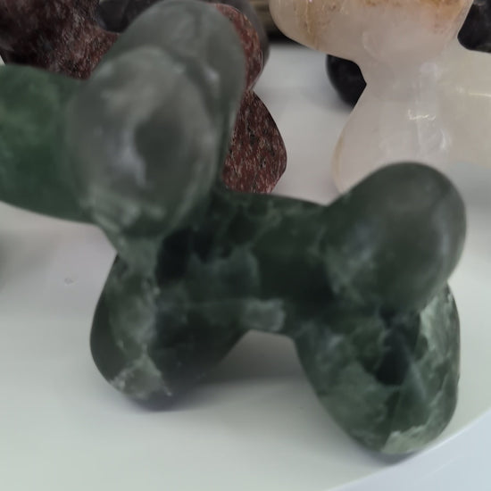 360-degree pan of the complete Balloon Dog collection featuring hand-carved specimens in Pyrite, Yooperlite, Green Fluorite, Rose Quartz, and Garnet in Matrix.