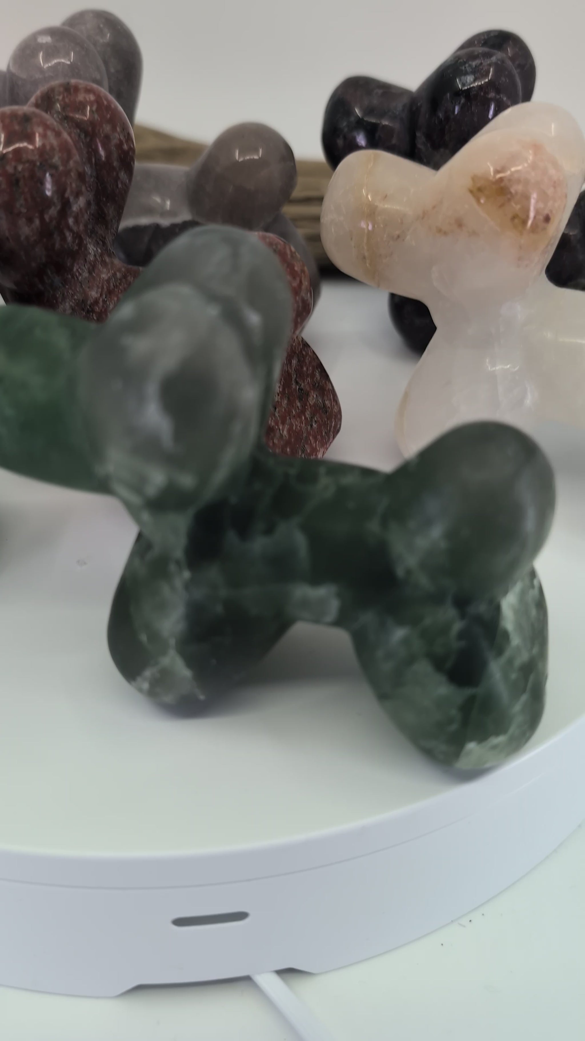 360-degree pan of the complete Balloon Dog collection featuring hand-carved specimens in Pyrite, Yooperlite, Green Fluorite, Rose Quartz, and Garnet in Matrix.