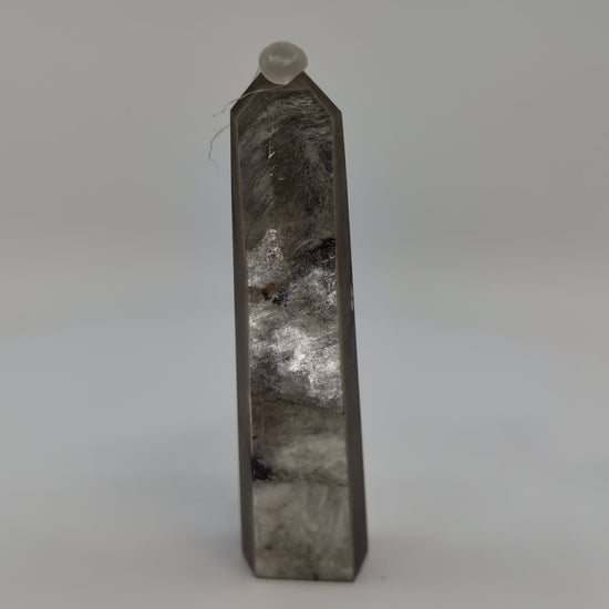 360° rotation video showing polished Golden Mica tower with metallic bronze sheen