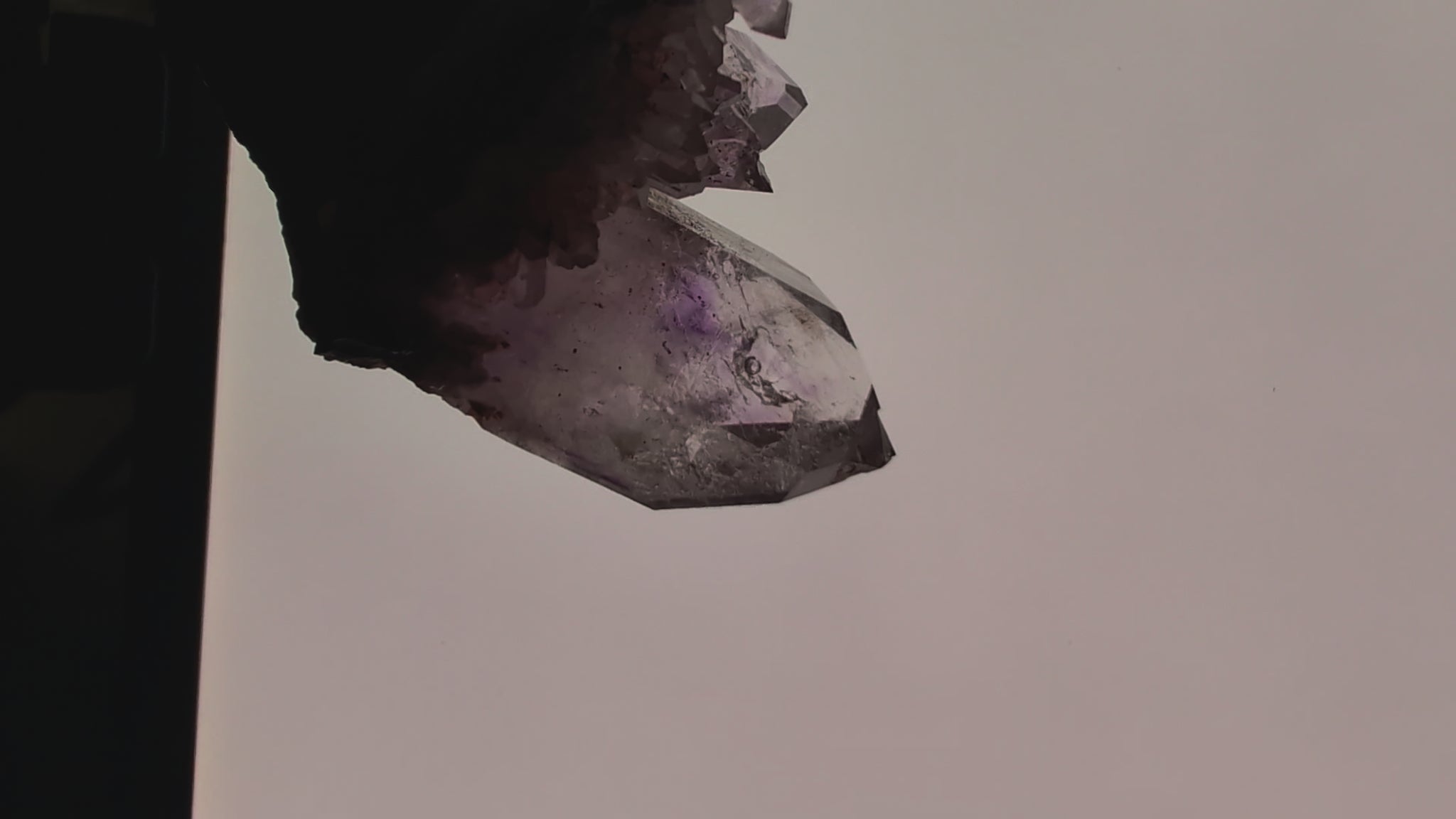 Video showing moving enhydro bubble inside Brandberg amethyst