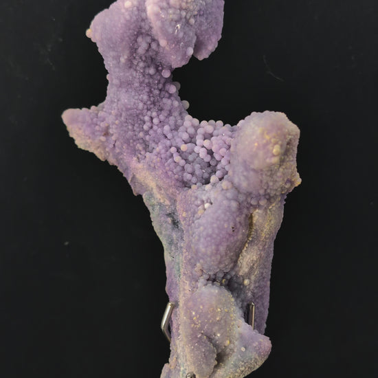 360-degree video rotation of The Dancer grape agate specimen highlighting sculptural form, druzy shimmer, and full profile from all angles