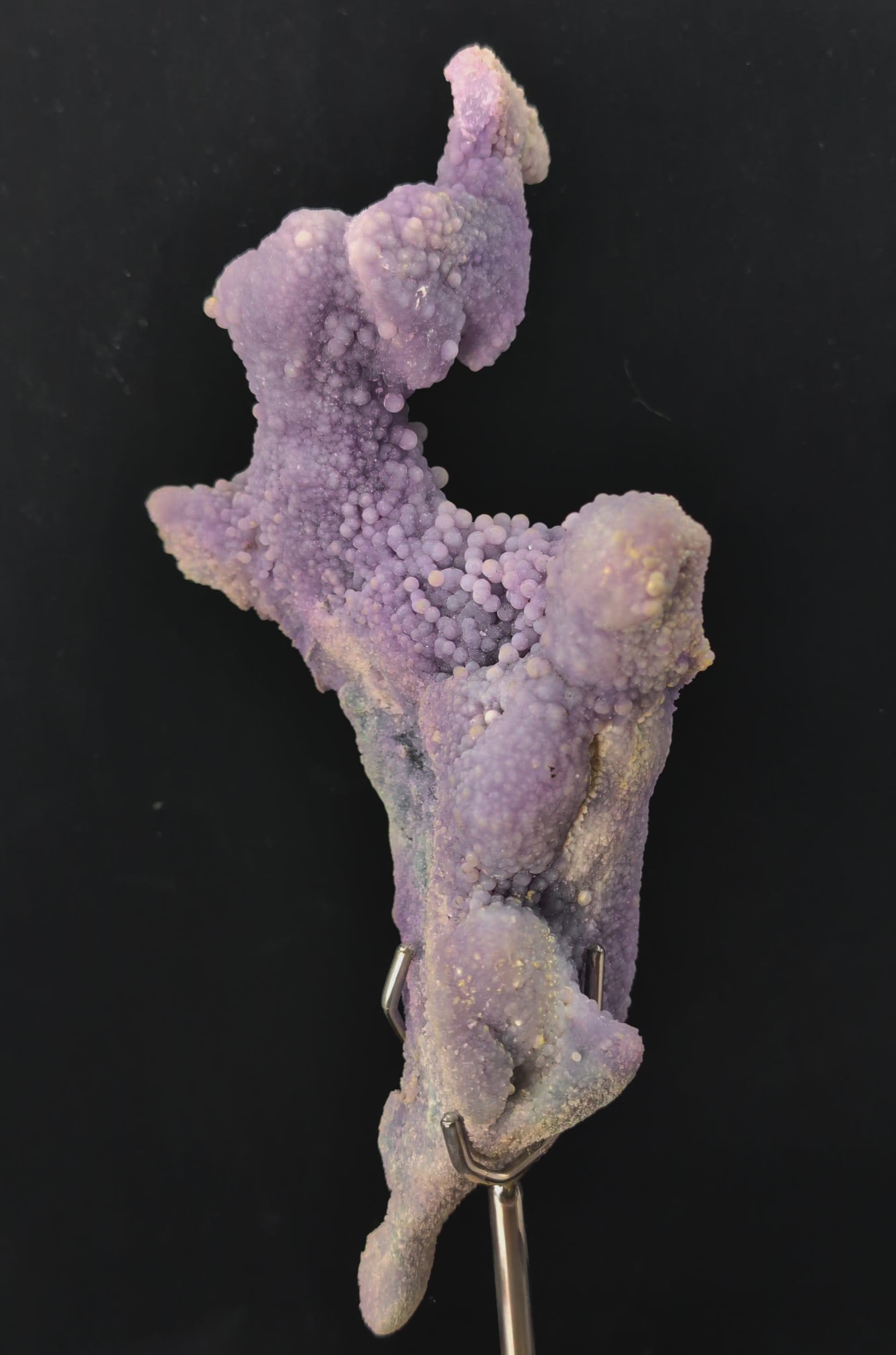 360-degree video rotation of The Dancer grape agate specimen highlighting sculptural form, druzy shimmer, and full profile from all angles