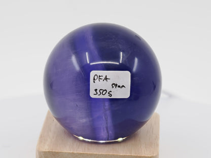 59mm Purple Fluorite sphere labeled PF-A showing natural violet banding and 350g weight.