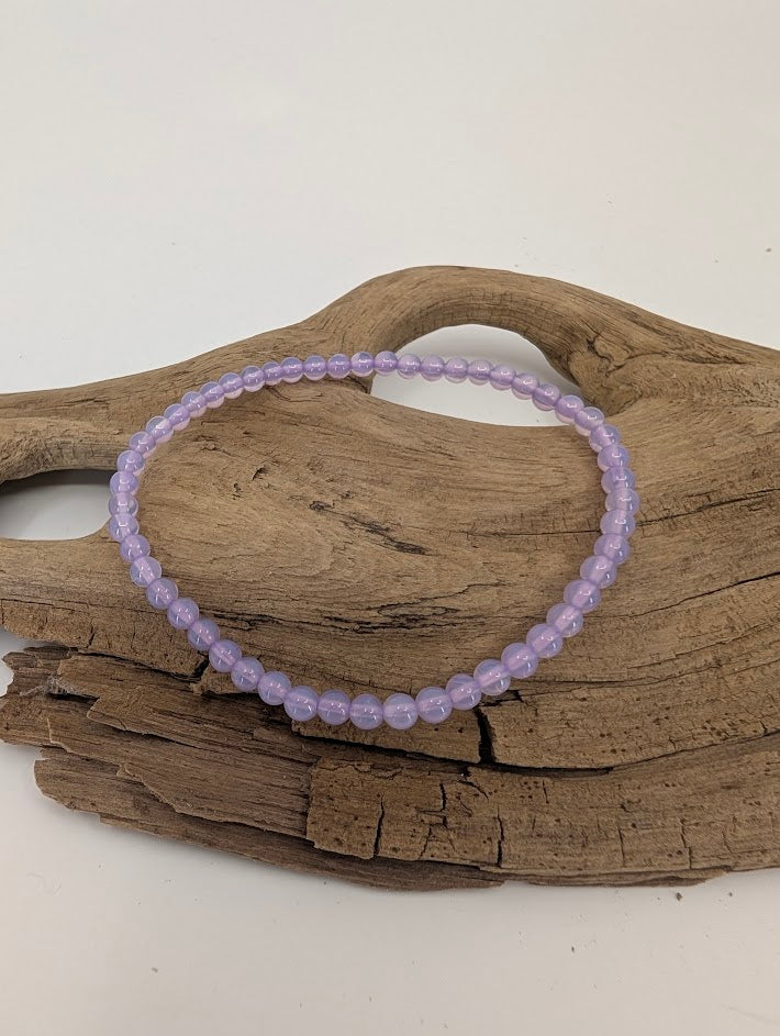 4 mm Purple Jade bracelet showing soft lavender tone and high polish