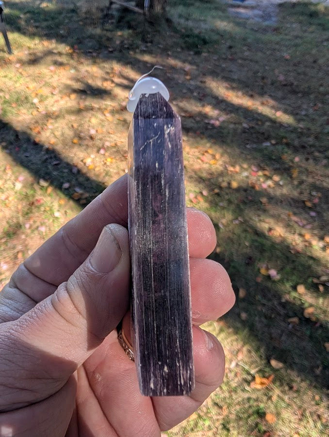 Side profile of Brazilian Purple Lepidolite Mica Tower showing layered shimmer and reflective mica sheets