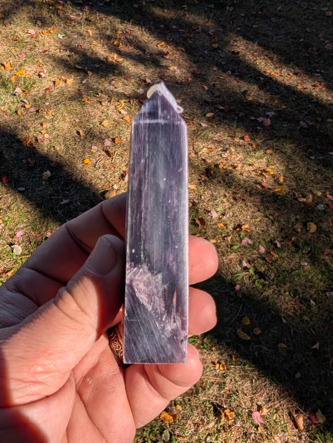 Side profile of Brazilian Purple Lepidolite tower showing layered mica and violet shimmer