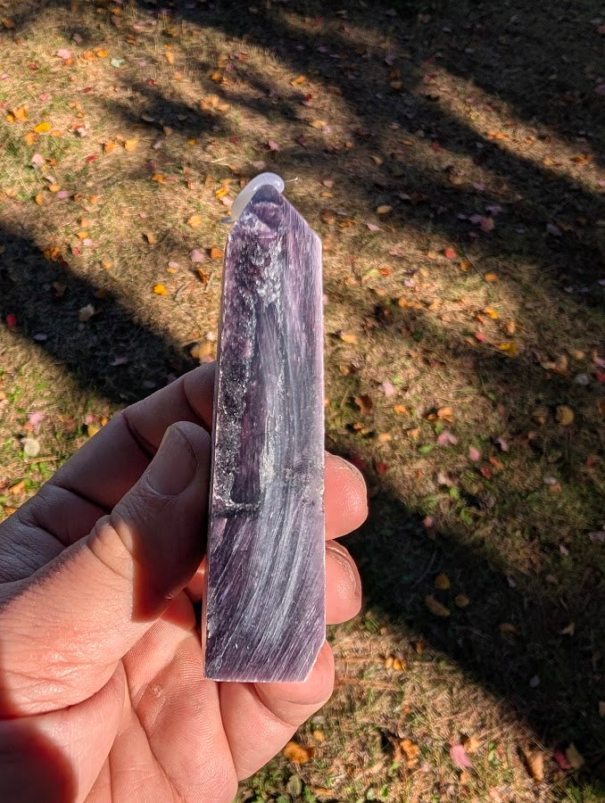 Side profile of Brazilian Purple Lepidolite tower showing layered mica and violet shimmer