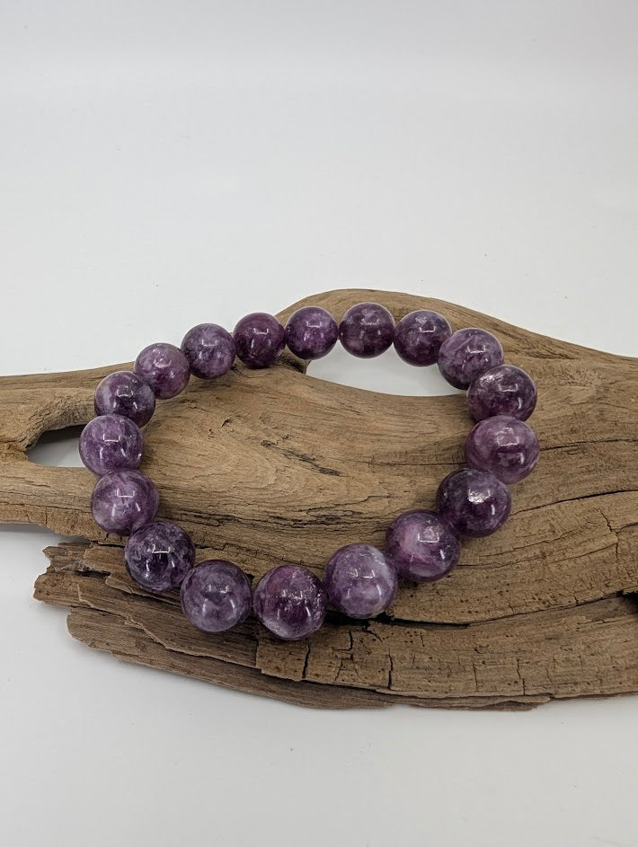 12 mm Purple Mica (Lepidolite) bracelet showing violet tone and silver shimmer