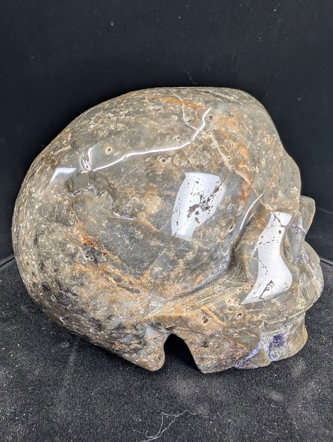 Right side view of Purple Silk Fluorite Skull with polish and silky zoning
