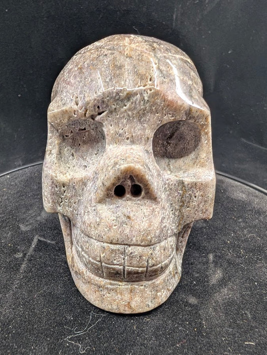 Purple Sphalerite skull, front view showing polished jaw and sockets