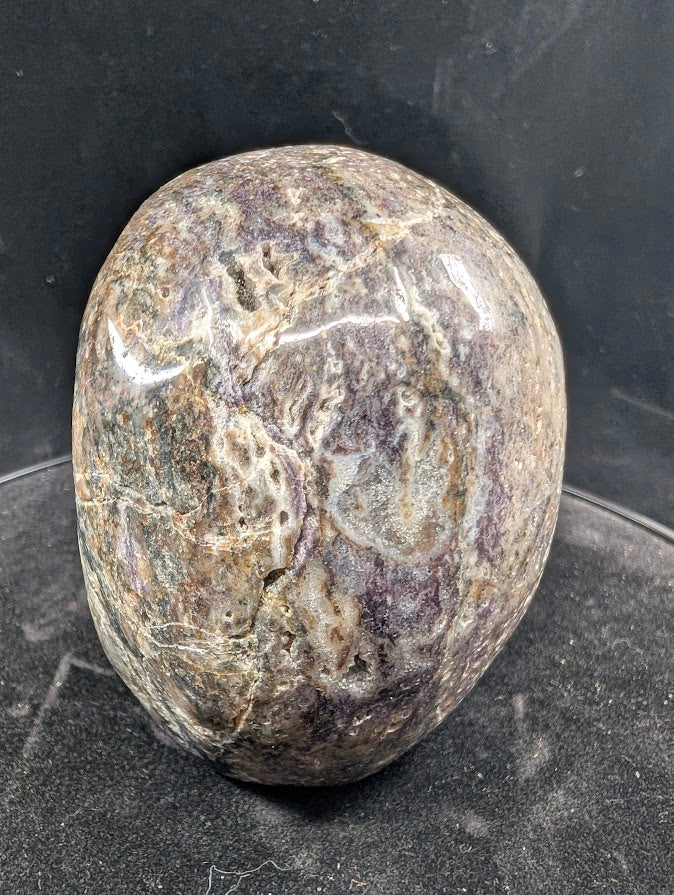Right profile of Purple Sphalerite skull showing natural vugs and polish