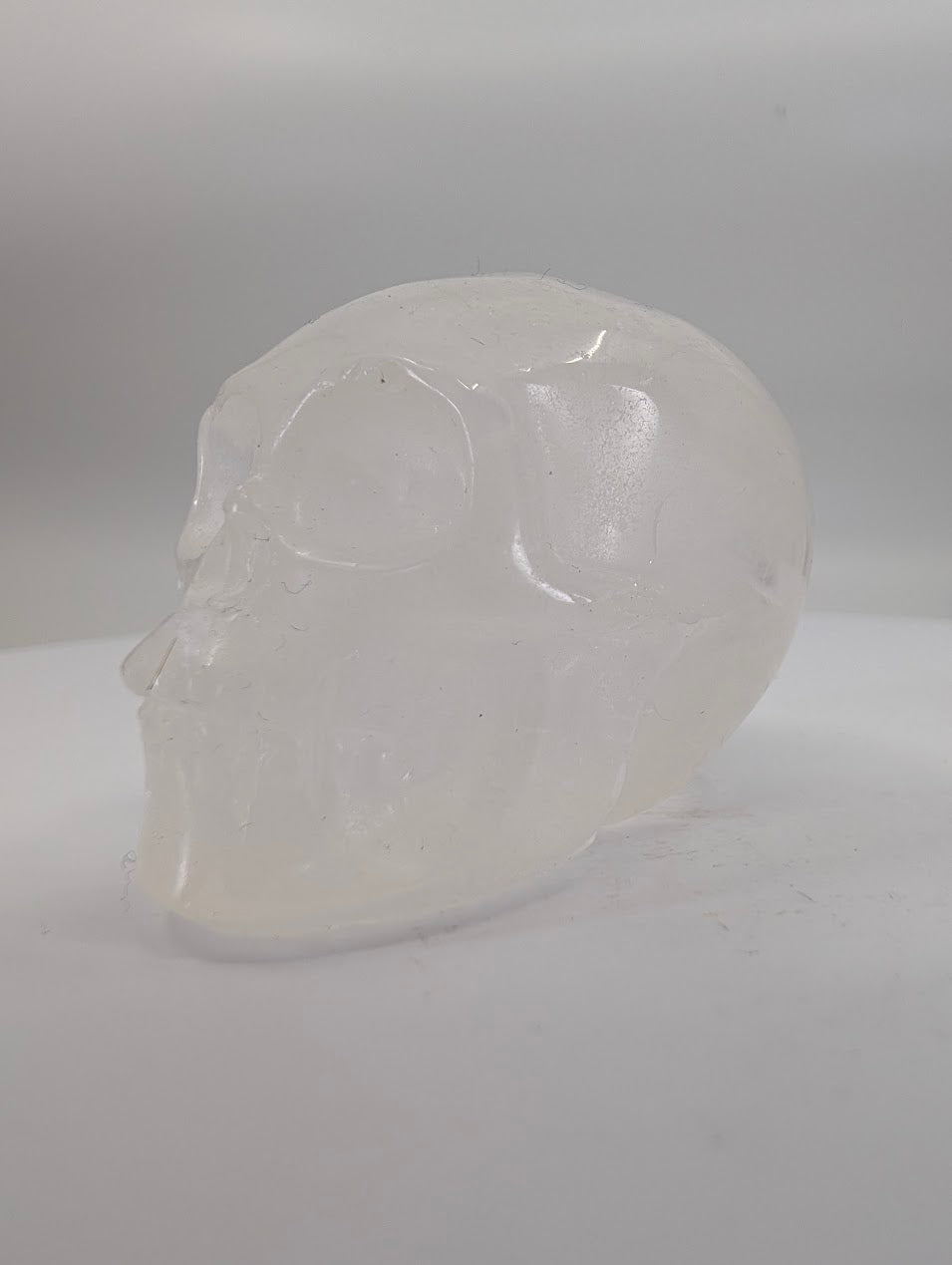 Quartz crystal skull carving – 41mm hand-carved natural stone – Legacy Crystals and Minerals