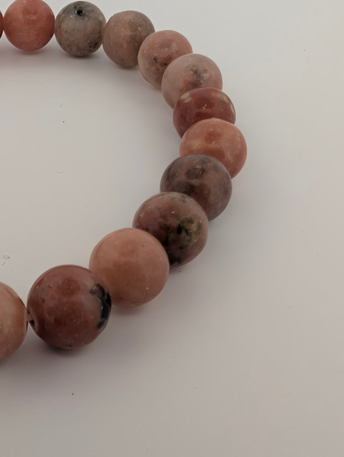 Detail of 8mm bracelet highlighting septarian inclusions and polished finish
