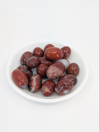 Red Jasper tumbled stones AAA grade – main image