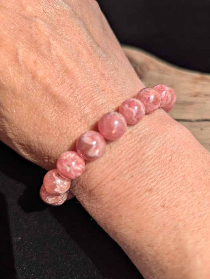 Intuitively selected 9mm polished Argentinian Rhodochrosite beaded stretch bracelet