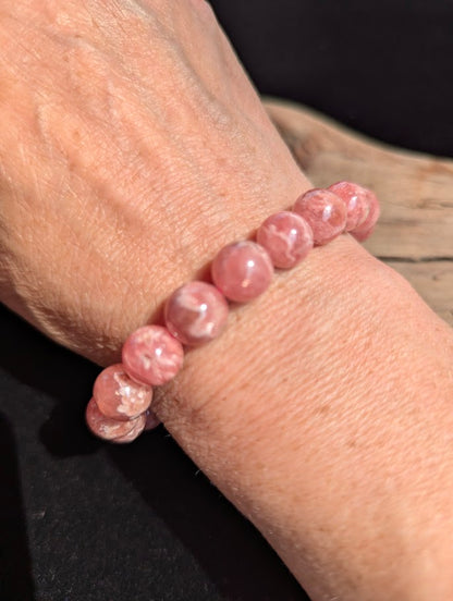 Intuitively selected 9mm polished Argentinian Rhodochrosite beaded stretch bracelet