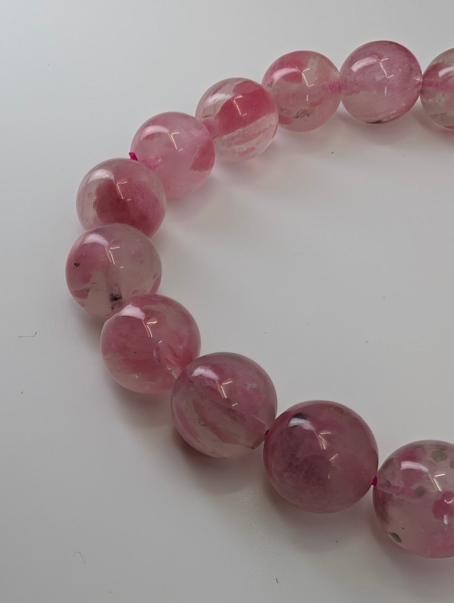 Natural Madagascar rhodonite bracelet with 10 millimeter polished pink beads