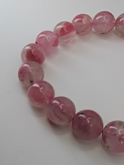 Natural Madagascar rhodonite bracelet with 10 millimeter polished pink beads