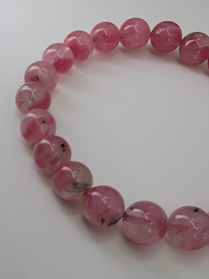 Rhodonite bracelet from Madagascar featuring 9 millimeter quartz-hosted pink beads