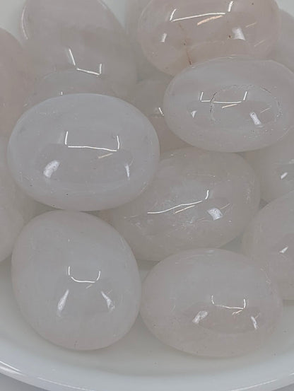 Close-up of soft pink Rose Quartz tumbles