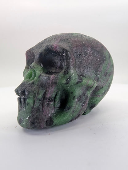 Ruby in Zoisite crystal skull carving – 41mm hand-carved natural stone