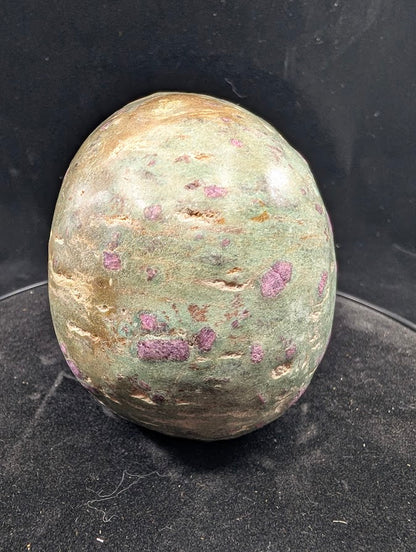 Back of Ruby in Zoisite skull showing mottled green matrix and ruby patches