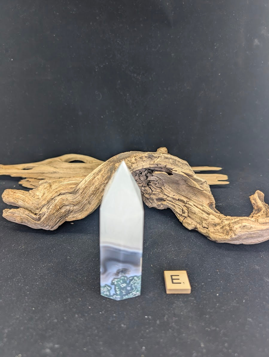 Side angle of Variant E showcasing the architectural symmetry.