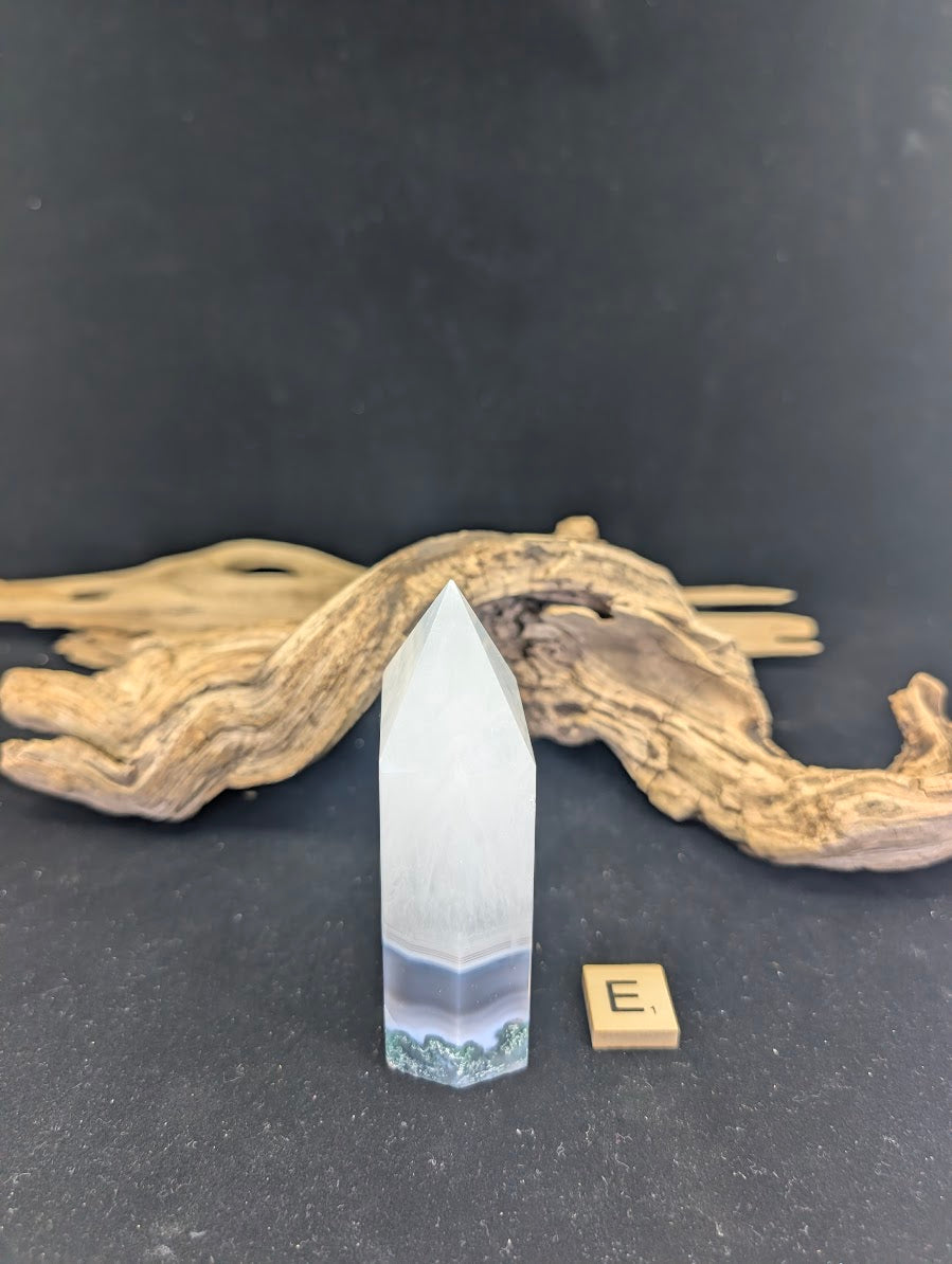 Side angle of Variant E showcasing the architectural symmetry.