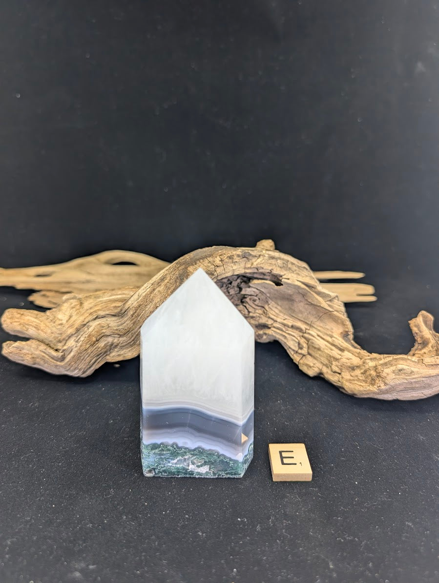 Back view of Variant E displaying clean chalcedony translucency.