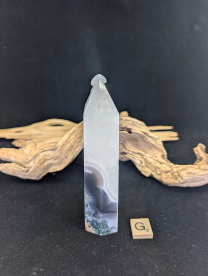 Side angle of Variant G showcasing the misty mountain aesthetic.