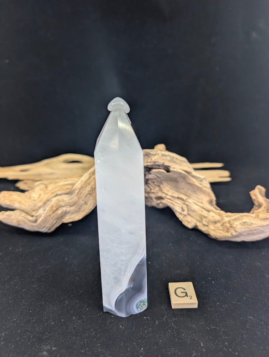 Side angle of Variant G showcasing the misty mountain aesthetic.