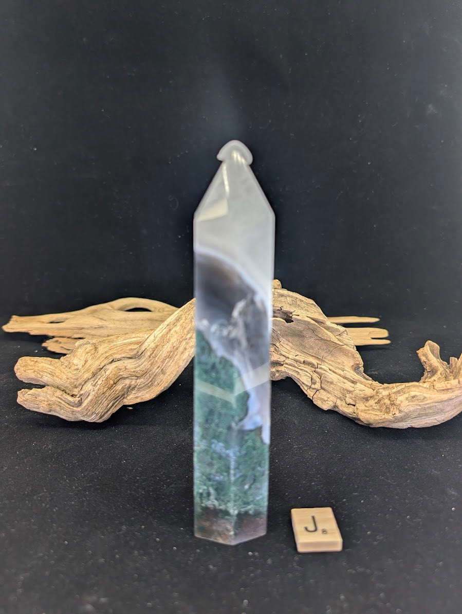 Side angle of Variant J showing the sharp hexagonal polish.