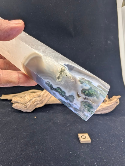 Macro detail of the scenic landscape transition in Variant O tower.